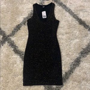 Black (gold) shimmery body con flattering dress